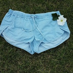 Fabletics, blue shorty shorts